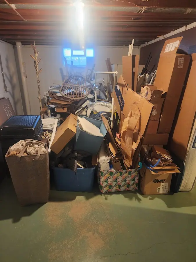 Roll-off dumpster container at job site for 4 Yard Dumpster Rental in Ferry Pass